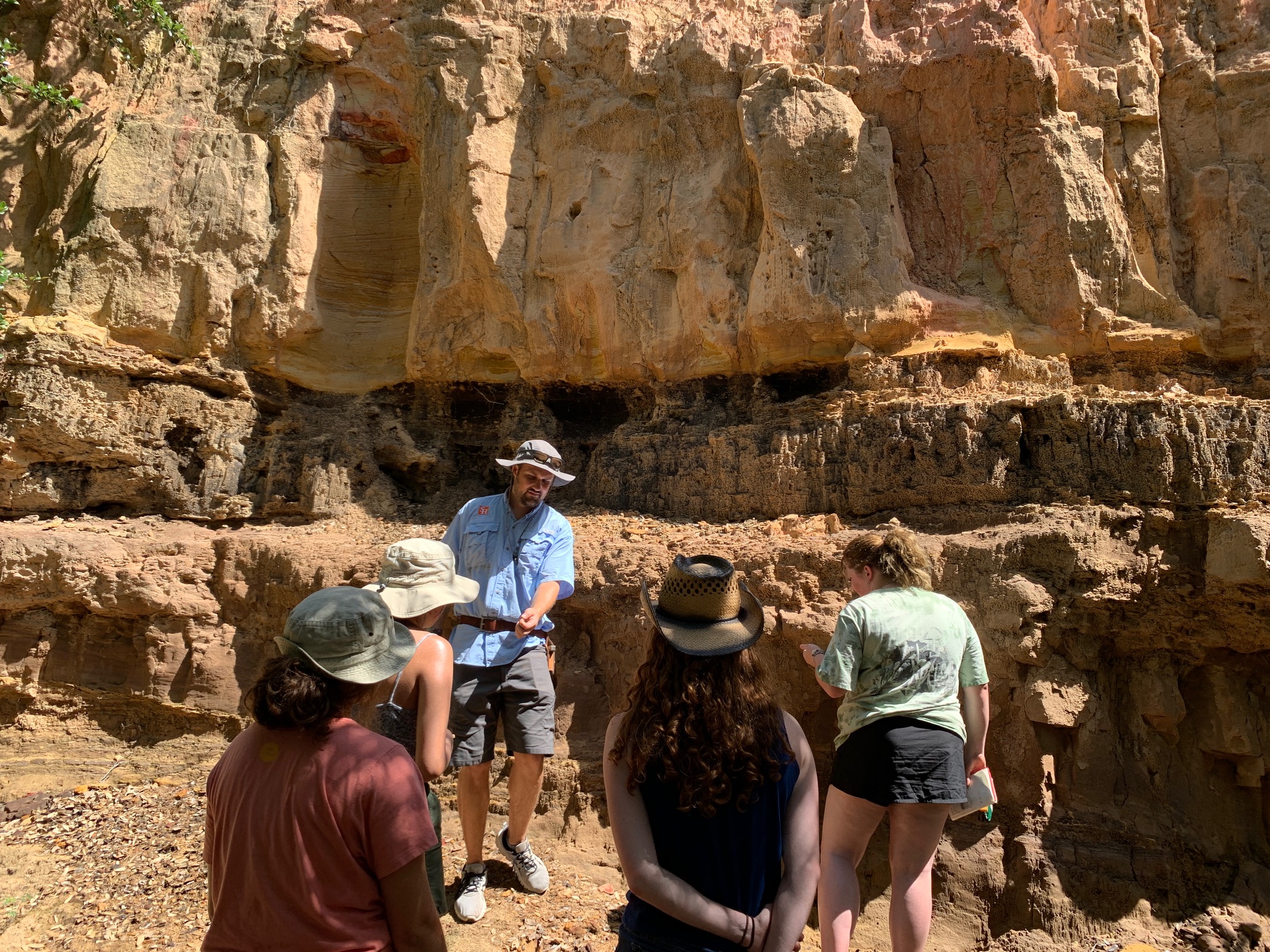 Dr. Moss discussing ancient sediments in Bastrop, TX